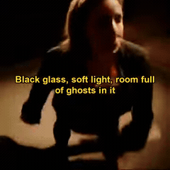 A frame from a framebeat-authored music video — moody, captioned, generated end to end.